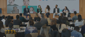 2019 Berkeley Inclusive Intelligence panelists on stage with audience in foreground.